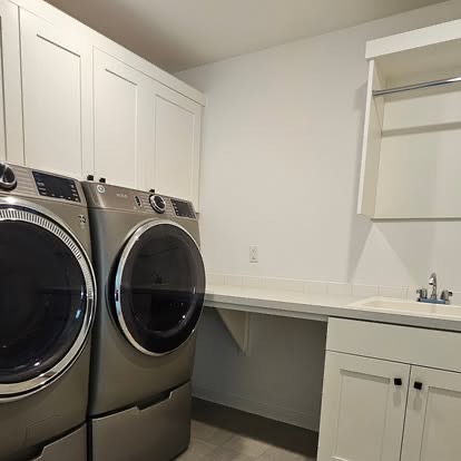 Laundry room with front-load washer and dryer