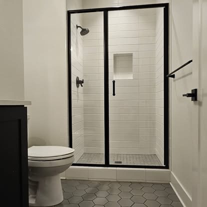 Spotless glass shower and tile floor